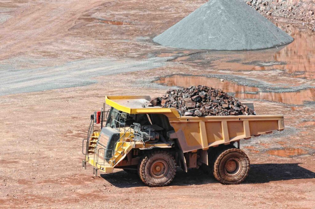 dumper-truck-driving-in-an-active-quarry-mine-of-p-2024-12-04-22-42-35-utc